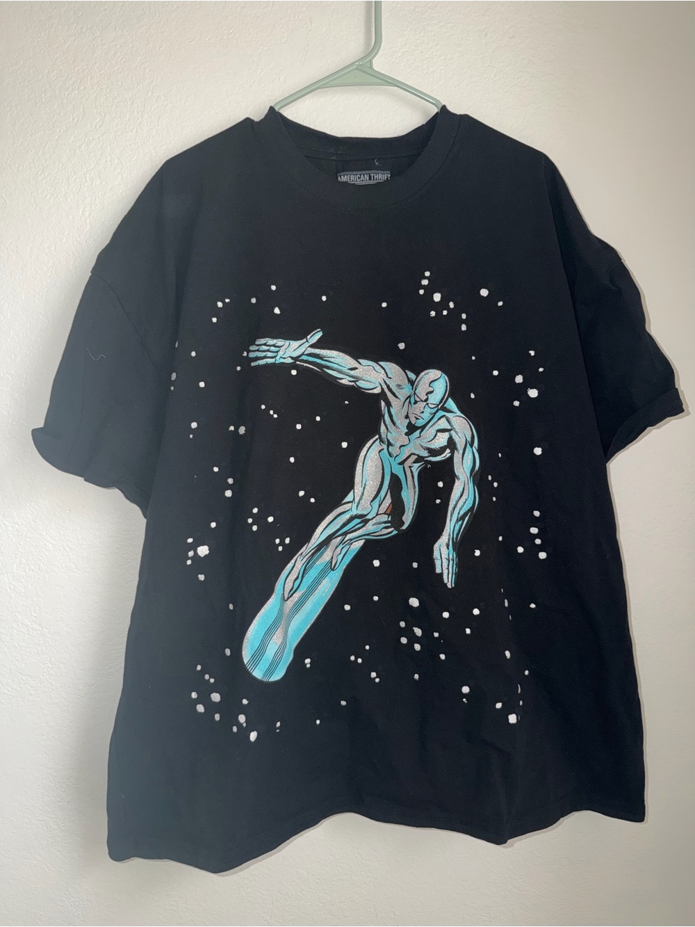 Black Short-Sleeve Graphic Tee with Blue Surfer Print